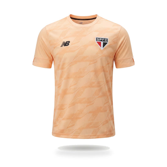 Camiseta São Paulo FC alternativa versión jugador, color melocotón, sobre fondo blanco